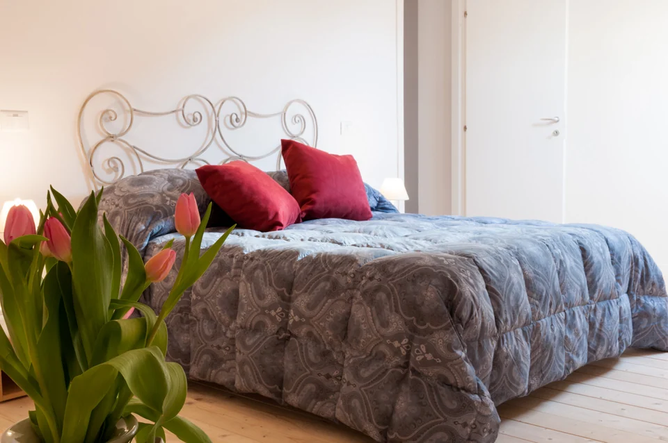 Milky Way attic bedroom with flowers in the foreground