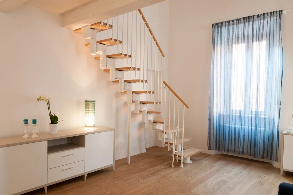 Milky Way living room with the staircase between its two levels